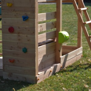 Klimwand en ladder van Speeltoestel Ranch met speelbrug Wave DLX en glijbaan
